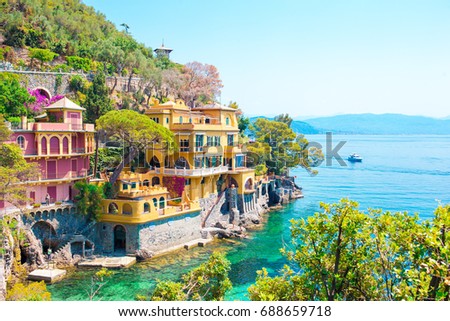 Beautiful sea coast with colorful houses in Portofino, Italy. Summer landscape Royalty-Free Stock Photo #688659718