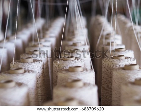 Textile threads industry Royalty-Free Stock Photo #688709620