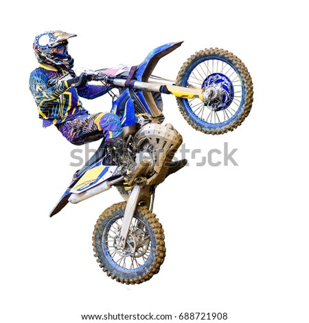 motorcycle Enduro rider in flight, on a white background to clip Royalty-Free Stock Photo #688721908