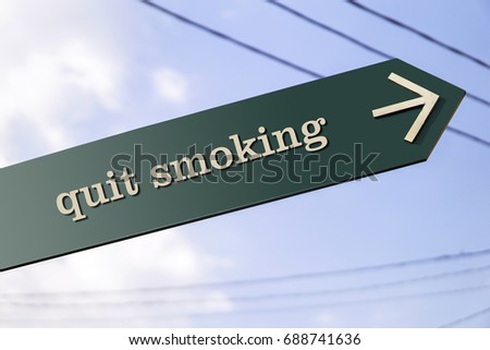 quit smoking word on road sign