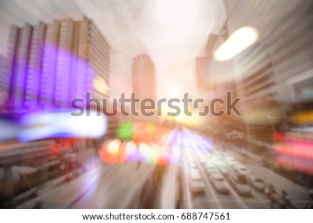 Abstract Double exposure photo of Colorful Night Bokeh And Tower City And Traffic Jam for civilization Concept Background.
