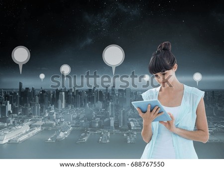 Digital composite of Holding tablet and City with marker location pointers