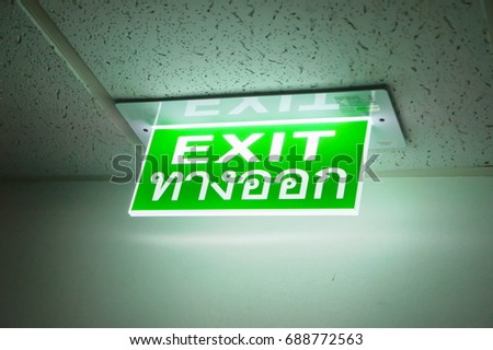 Emergency exit with thaialphabet.