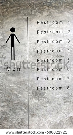 men toilet sign on the Polished plaster wall (vertical)