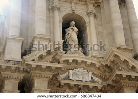 Madonna and angels statue. Close up church photo
