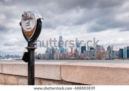 USA, New Jersey, View on Manhattan skyline from Ellis Island, Binoculars in foreground