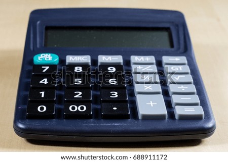 Bills, documents and papers with calculator. Office of the accounting office. Wooden table.