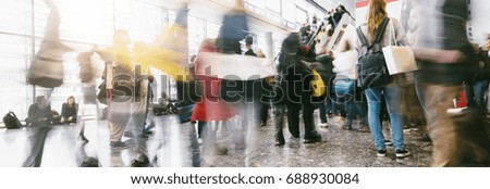 crowd of people in a Shopping mall