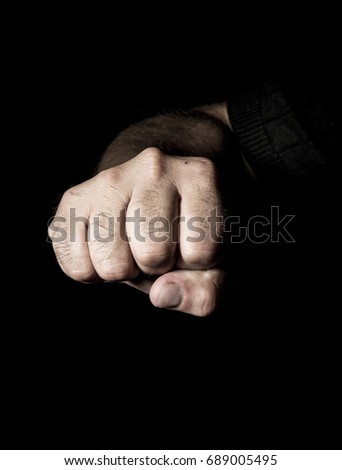 The hands of the man seized with power