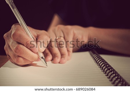 woman writing paper close up hand for business  / working at office 
