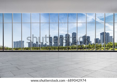 Panoramic skyline and buildings from glass window
