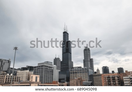 Blurred of Downtown Chicago on The Cloud Sky Background / With Copy Space,Filter Color Effect Dark Tone.