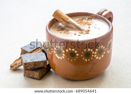 Hot cocoa in traditional Mexican clay mug