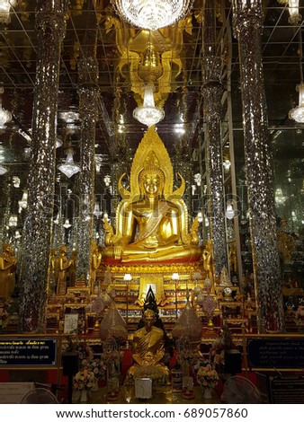 Image of Buddha in the glass chapel of Wat Tha Sung temple,Uthai Thani Province, Thailand