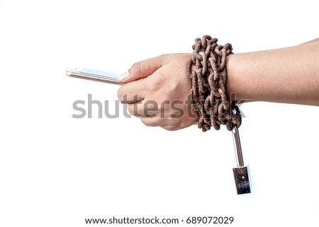 Hand holding smartphone with rust chain isolated on white background