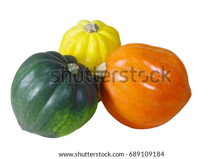 Orange, yellow, green pumpkin gourds isolated on white background