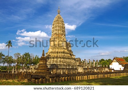 Old pagoda Wat Phra Si Ratanamahathat temple and blue sky  in Sisatchanalai Historical Park, Sukhothai province Thailand