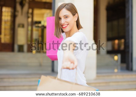 young successful woman shopping