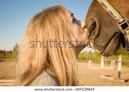 A girl and a horse 