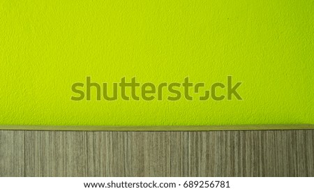 Copyspace of Green cement wall texture background with plywood or wooden texture background