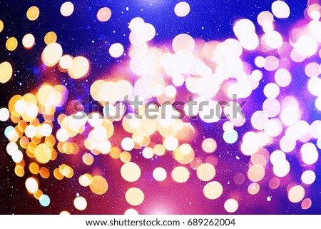 background with natural bokeh defocused sparkling lights. Colorful metallic texture with twinkling lights. Bright and vivid colors