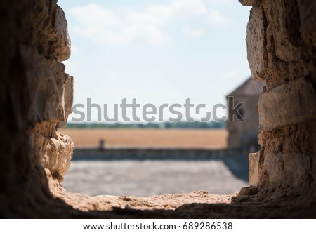 View from an arch, Brick background. Can be used for text or your logo.