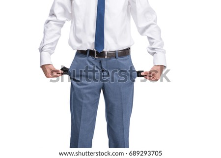 cropped view of poor businessman with empty pockets, isolated on white 