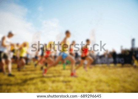 Blurred photo of runners group