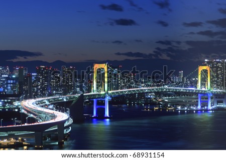 View of Tokyo downtown at night with Rainbow Bridge