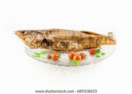 Smoked fish and cherry tomatos on the white background