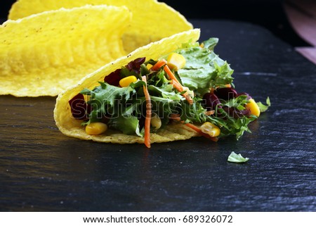 three mexican salat carnitas tacos