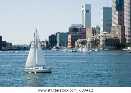 Sailing boats on St Charles River and skylines on background, Boston, Mass