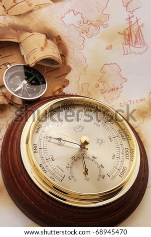 Compass and barometer on old chart of North Europe Royalty-Free Stock Photo #68945470