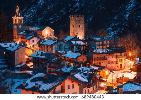 a nice old village in mountain during the winter season close to the xmas in Italy