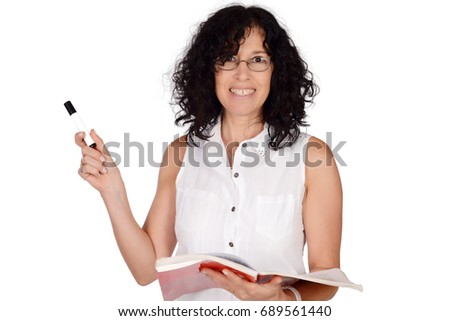 Portrait of beautiful school teacher holding books and pointing somewhere. Education concept. Isolated white background.