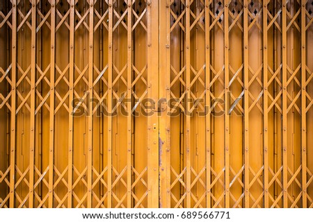 Yellow iron shutter door
