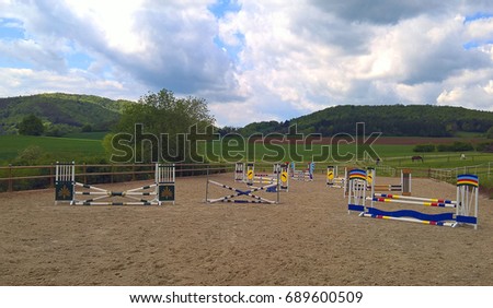 Manege for horses in the open air. Royalty-Free Stock Photo #689600509