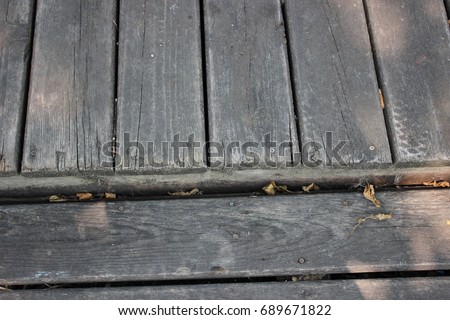Weathered wooden step.