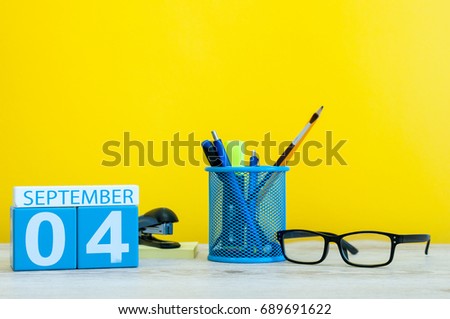 4th September. Image of september 4, calendar on yellow background with office supplies. Back to school concept