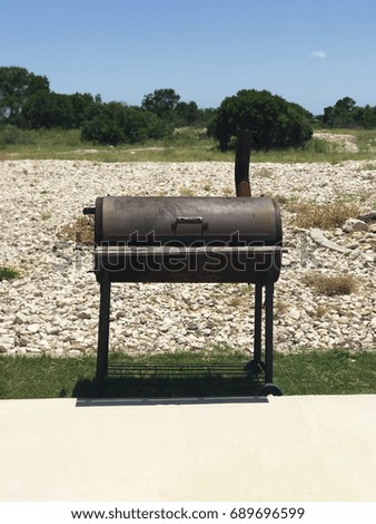 Charcoal barbecue pit