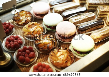 A bakery lined with macaroons Royalty-Free Stock Photo #689697865