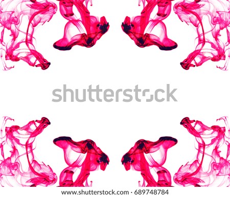 Color drop in water photographed in motion. Cloud of colorful ink in water isolated on white. Abstract background.