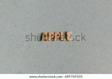 Apple word with pasta letters