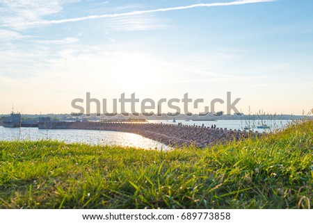 Green grass and harbor with twilight time