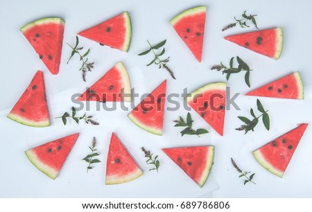 Top view of watermelon isolated on white background. sliced watermelon and mint leaflets. healthy food for diet. watermelon slice. Flat lay.