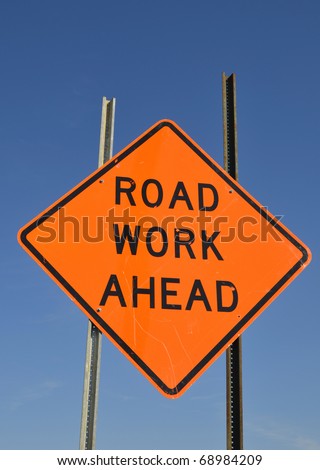 Road work ahead warning sign