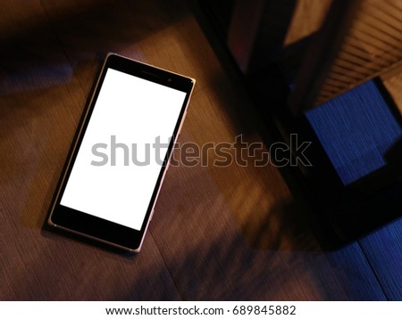 smartphone on table night light