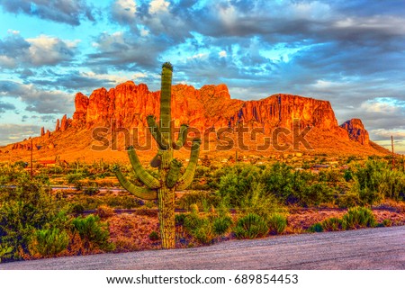 Cactus and red mountain at Goldfield Ghost Town Arizona Royalty-Free Stock Photo #689854453
