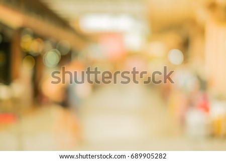 Blurred background : people shopping at market fair