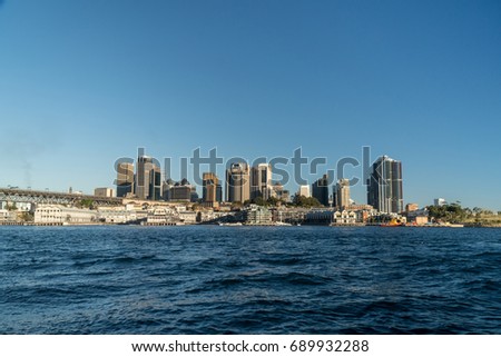 generic modern cityscape with water reflection in daytime, Sydney city with landmark skyscraper skyline